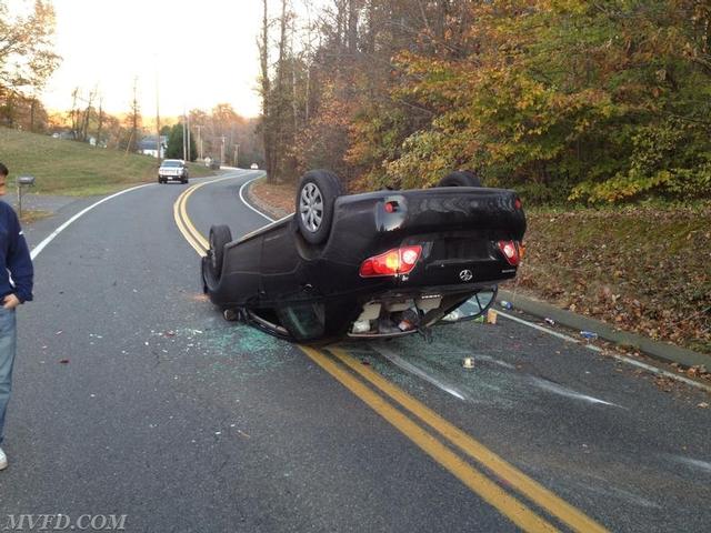 Units operate on this overturned vehicle off of New Market Turner Road in Huntersville